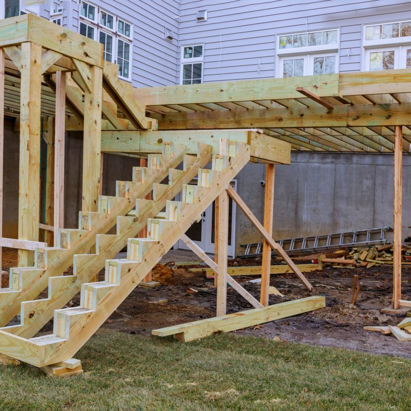 Installing deck patio construction. boards with above ground deck